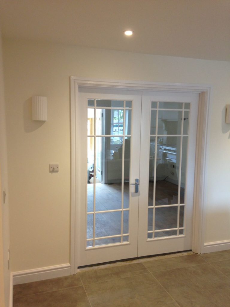 Newly decorated room and painted glass doors.