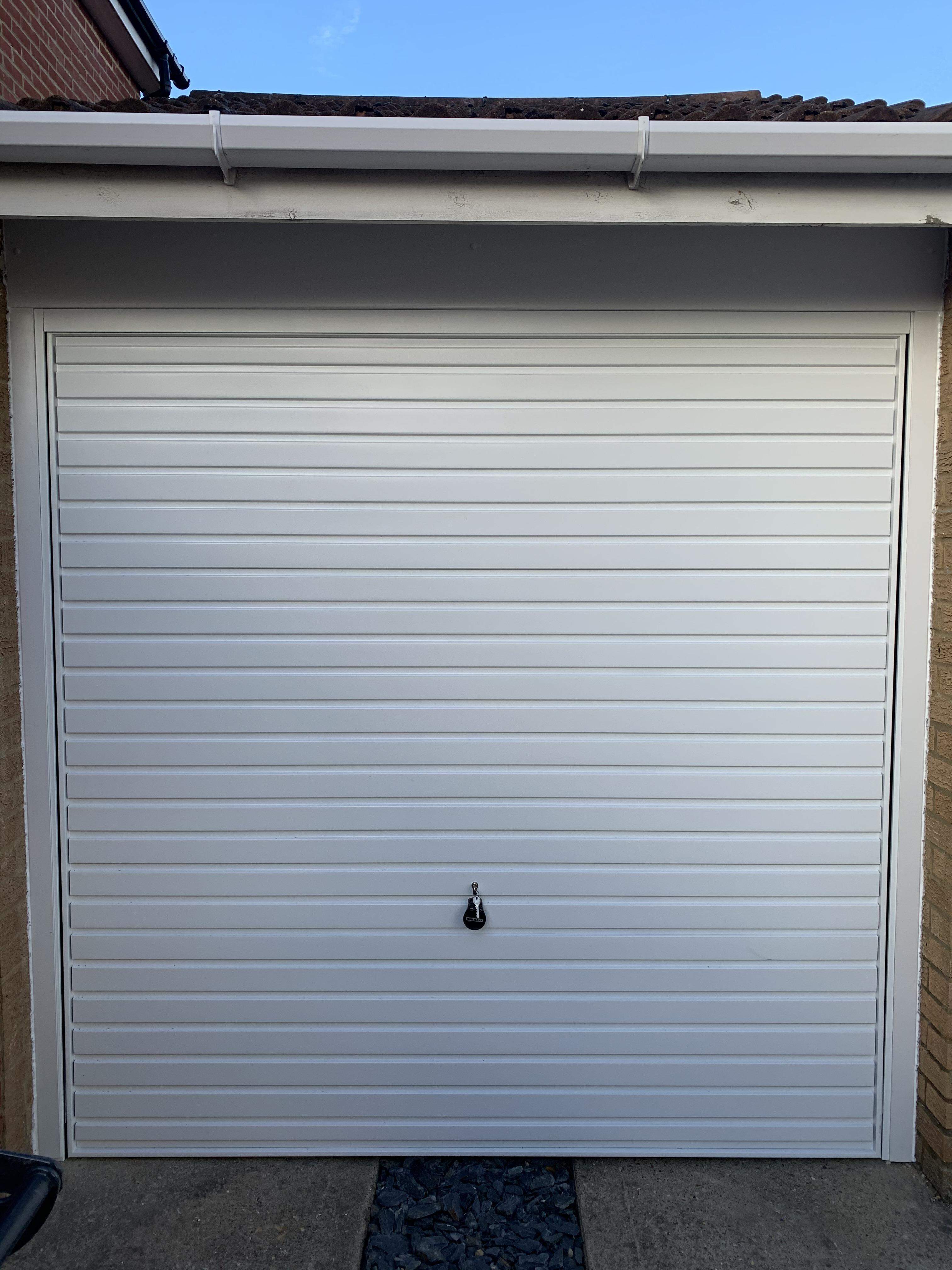 Single Steel (White) Horizontal Canopy Garage Door.