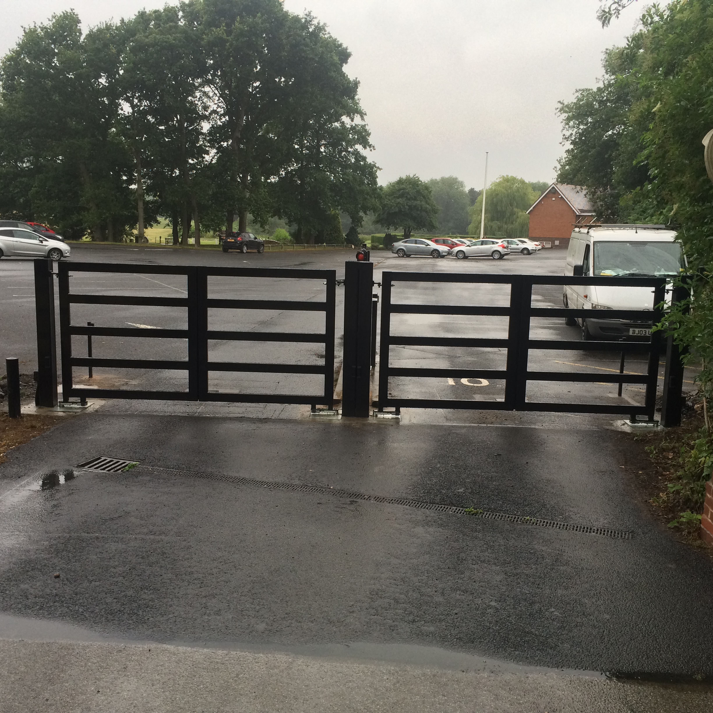 FIVE BAR STEEL IN OUT GATES AT GOLF CLUB
