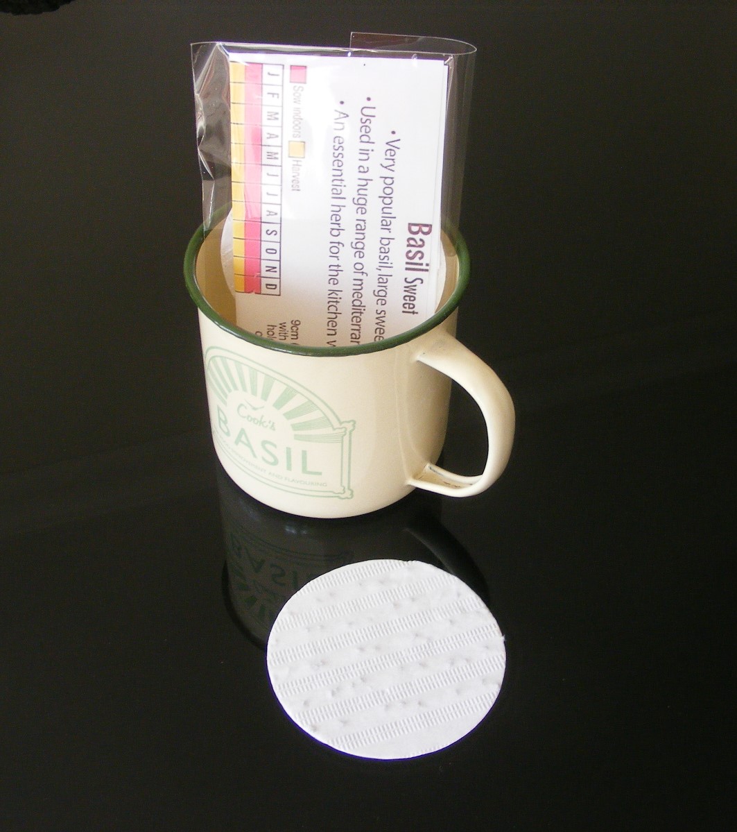 Enamel mug and sweet basil seed mat