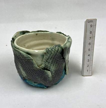 hand-thrown in stoneware clay