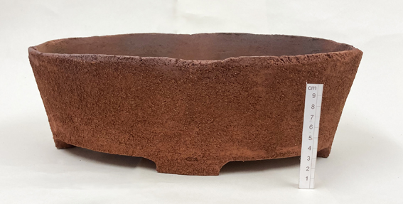 un-glazed coarse stoneware clay with an oxide wash detail. 45cm