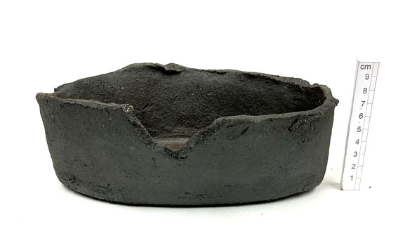 un-glazed coarse black stoneware clay
