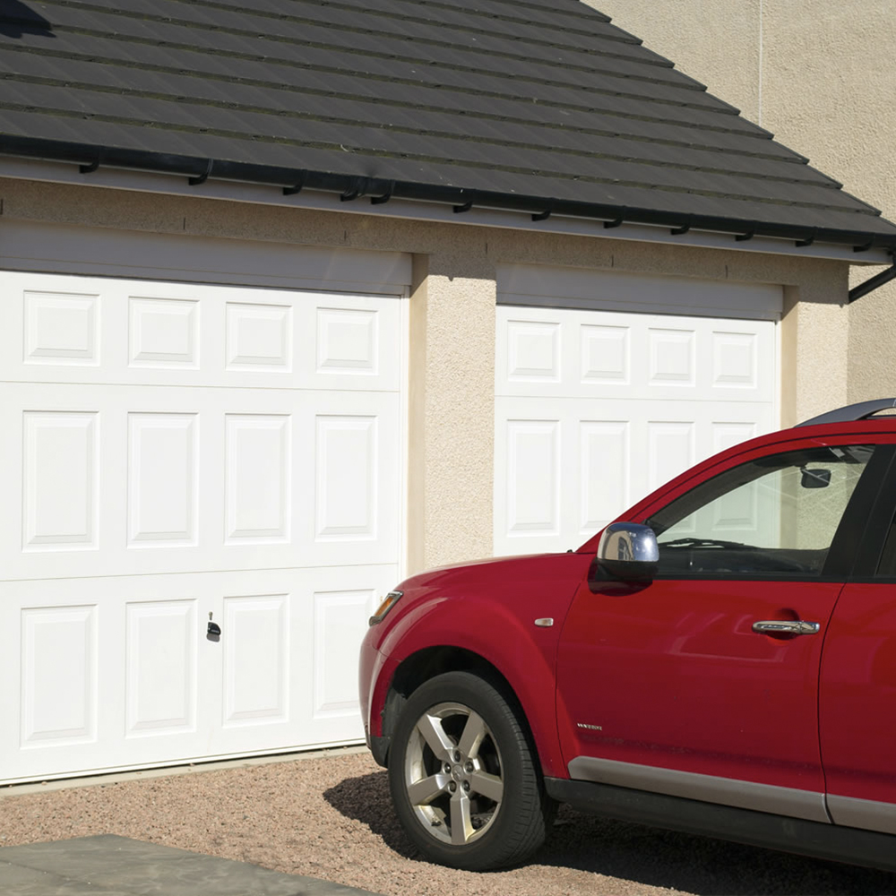 Single Steel (White) Beaumont Retractable Garage Doors.