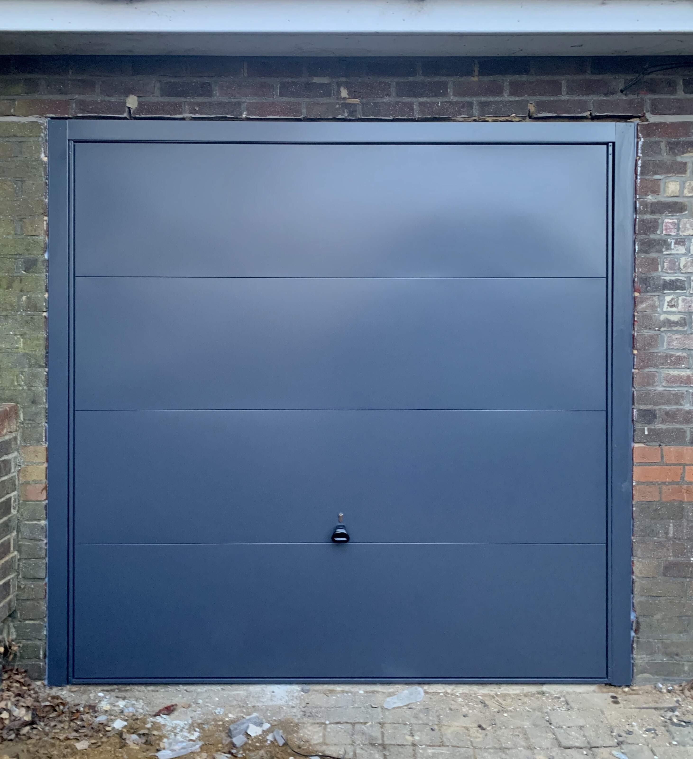 Single Steel (Anthracite) Design 100 Retractable Garage Door.