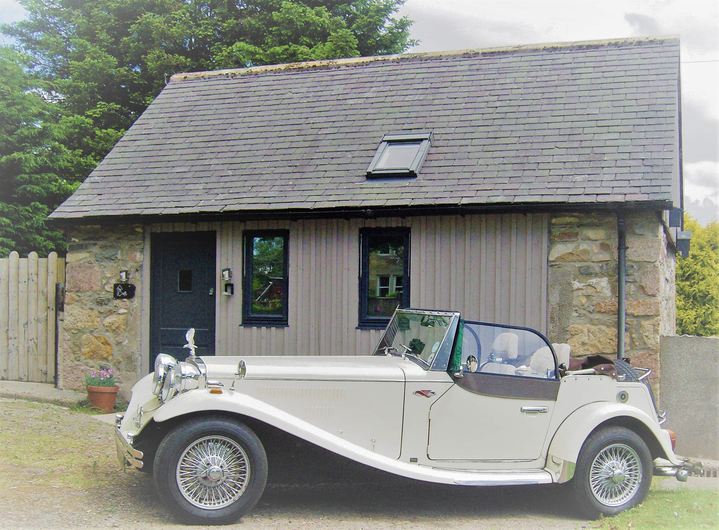 The Croft with the beautiful Falcon parked outside - Courtesy of Ron & Gail