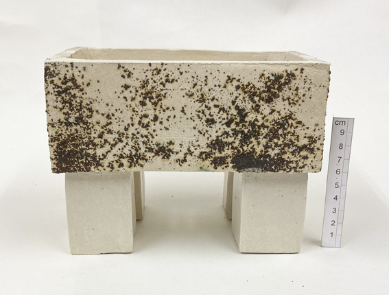 slab built white stoneware clay with iron spangles