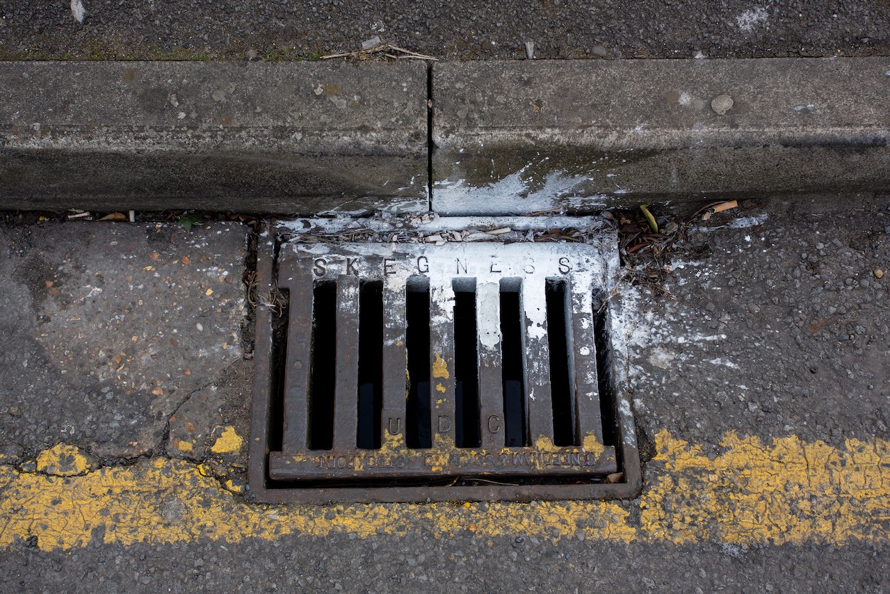 down the drain
