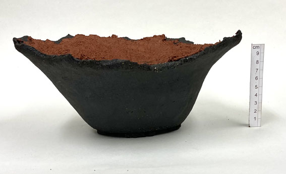 un-glazed coarse black and red stoneware clay