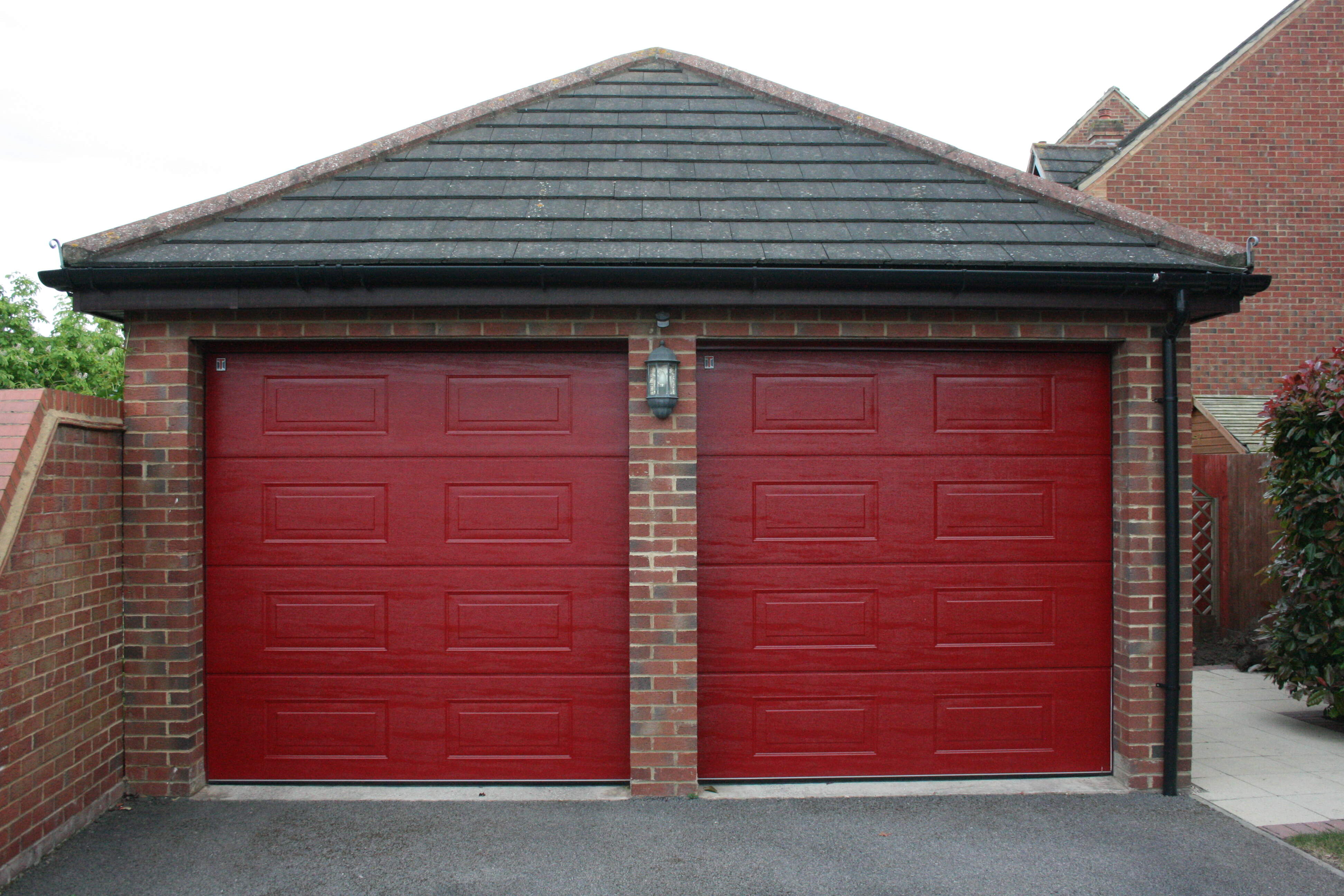 Single Insulated Georgian Woodgrain (Red) Sectional Garage Doors.