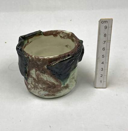 hand thrown stoneware with applied detail