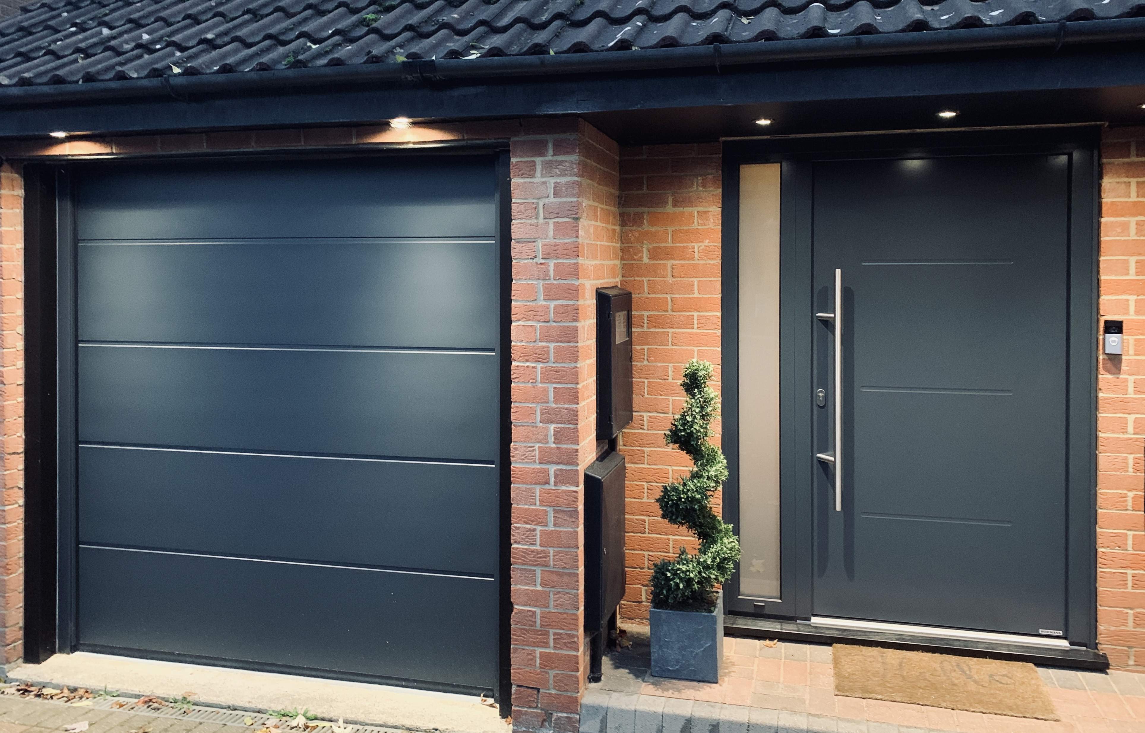 Single Insulated Smooth (Anthracite Grey) L-Ribbed Sectional Garage Door.