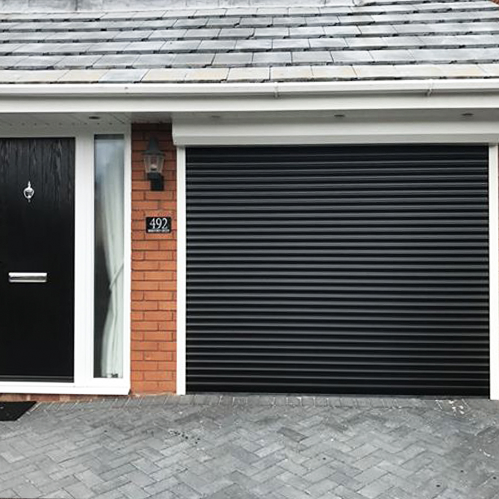 Single Insulated 55mm Lath (Black) Roller Shutter Garage Door with White Frame.