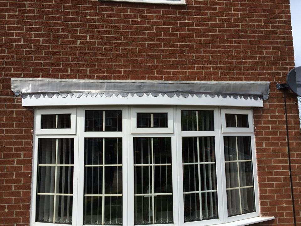 New lead flashing fitted to bay window