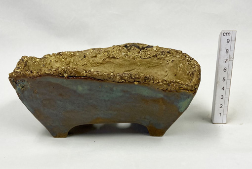 slab built in a coarse buff stoneware clay
