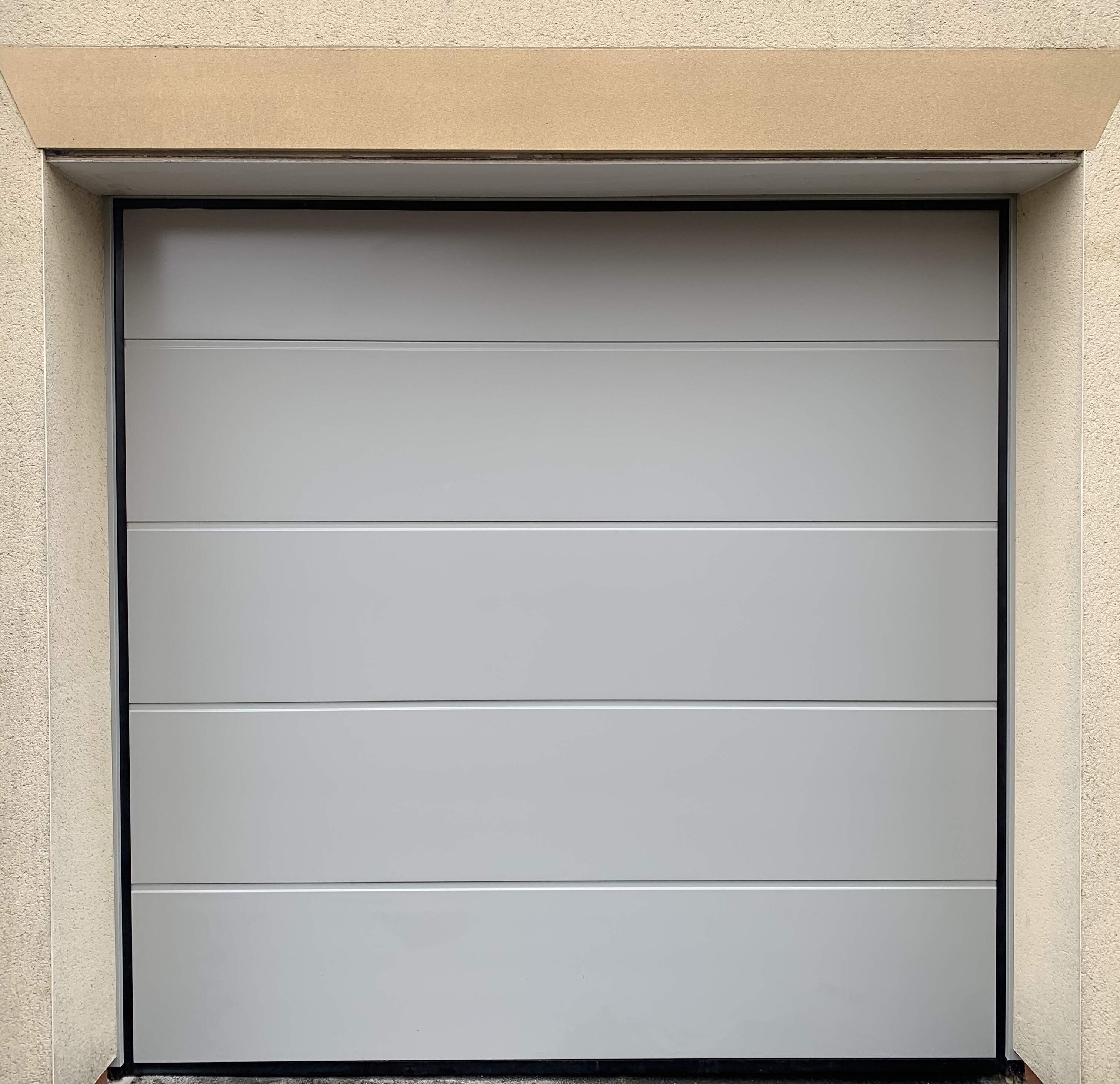 Single Insulated Smooth (Agate Grey) L-Ribbed Sectional Garage Door.