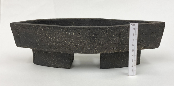 un-glazed coarse black stoneware clay