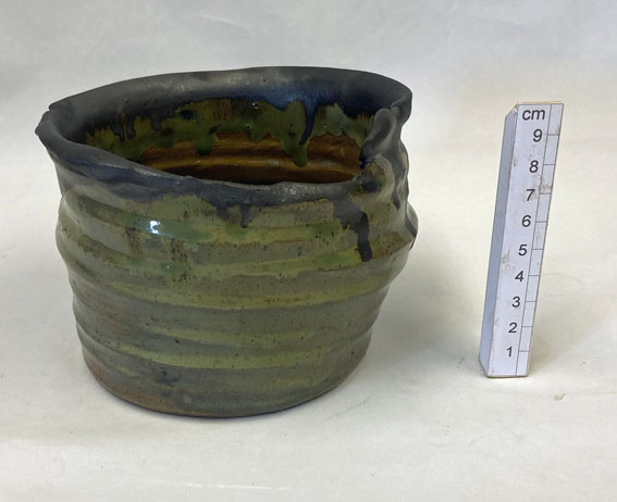 hand-thrown stoneware clay with a green glaze