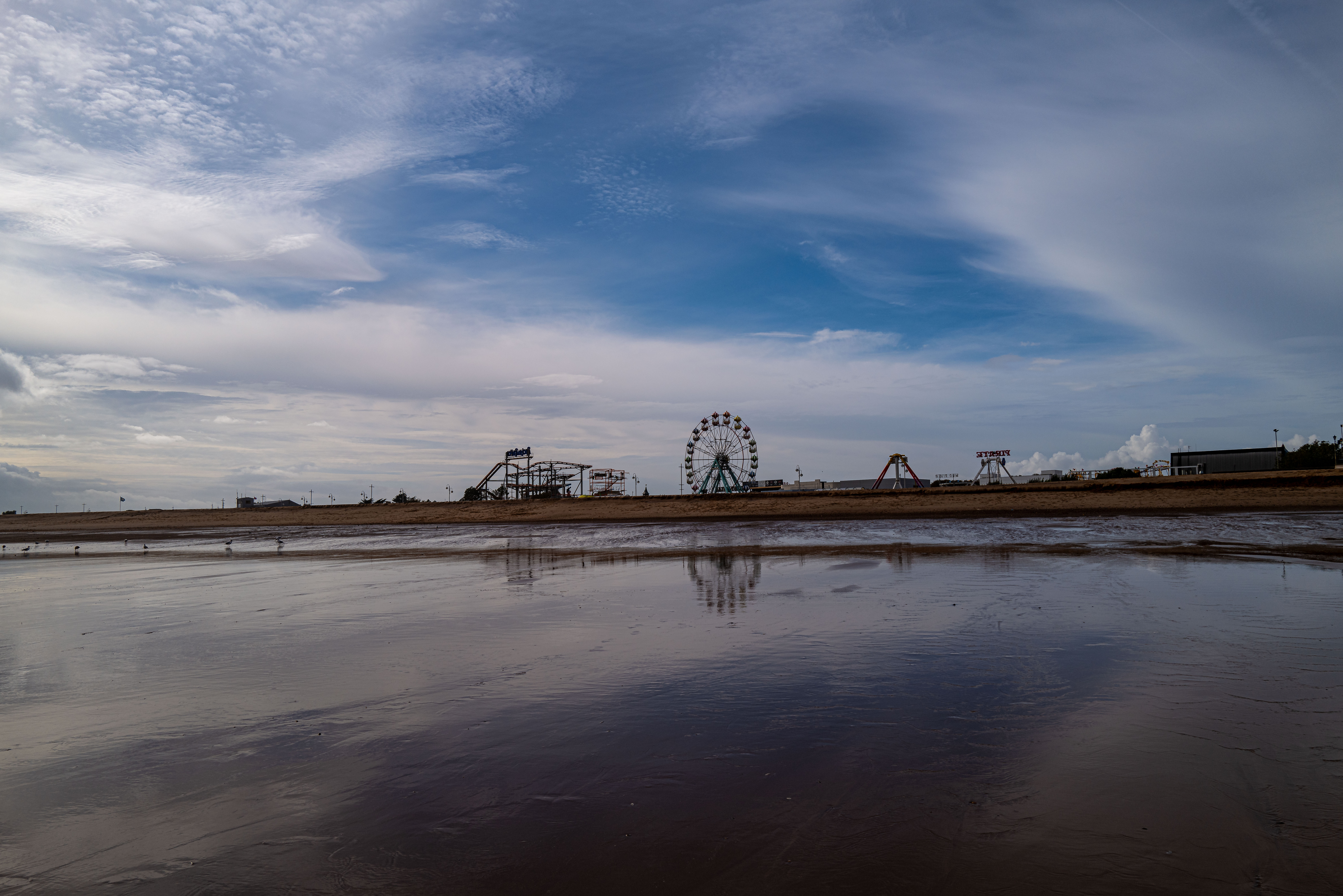 Skegness reflections fron the north Sea looking towards Bottons fair